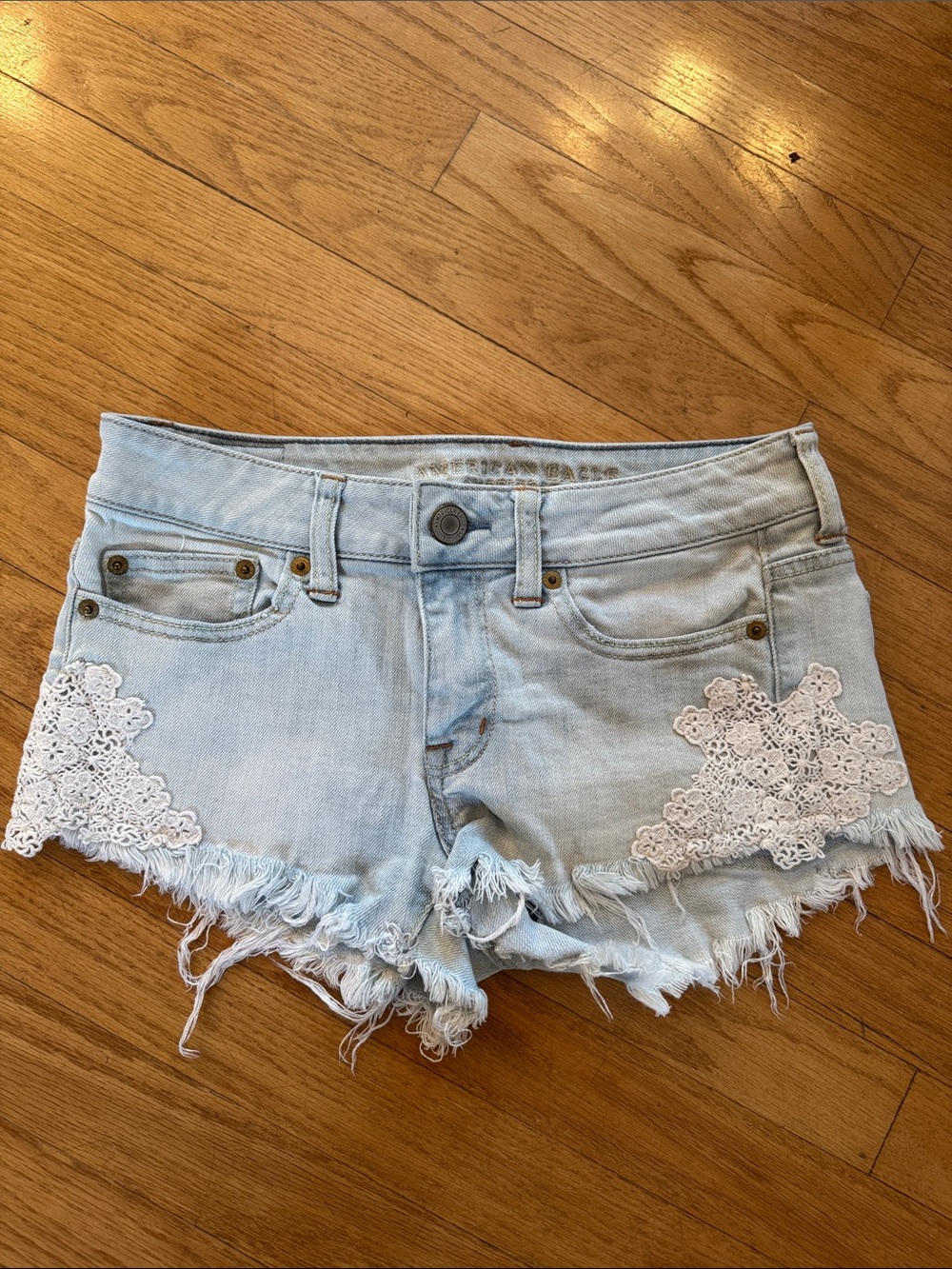 American Eagle Outfitters Light Wash Denim Shorts with White Lace